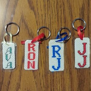 Homemade cross stitched keychains